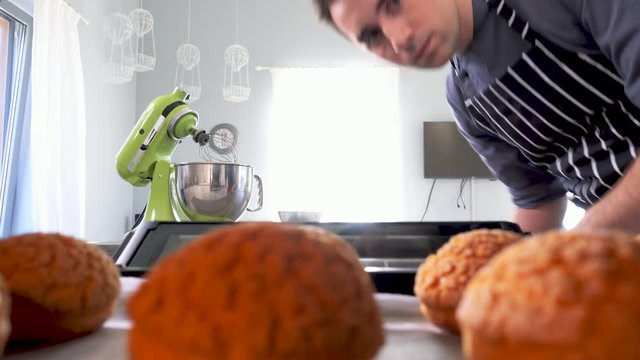Chef cooking dessert on a modern kitchen at home