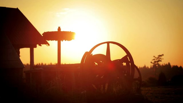 Morning sunrise at village background. Sun rises in village. Morning sunlight in rural village time lapse. Sun dawn on village landscape. Morning sunshine landscape on rural background