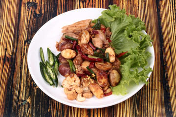 Spicy fried jackfruit seeds and chicken with roasted chile paste.