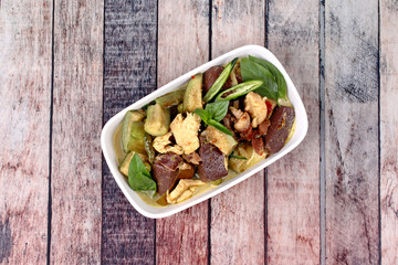 Green chicken curry in coconut milk with long eggplant .