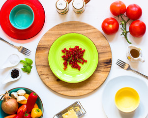 Delicious pasta with fresh vegetables and cheese, on a wooden background .