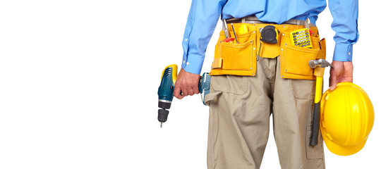 Fototapeta premium Construction worker with helmet and drill.