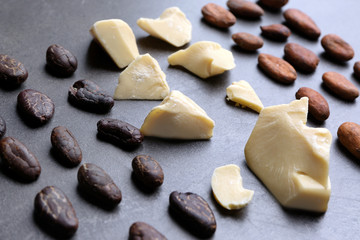 Composition with aromatic cocoa butter on table