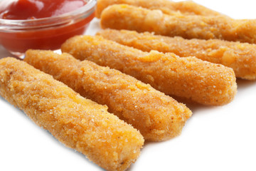 Delicious fried cheese sticks on white background