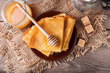 Pancakes with honey. Selective focus