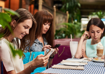 Women chatting in cafe