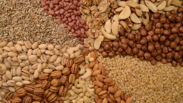 Nuts mix in a canvas bag in table.