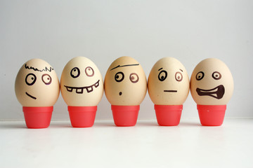 Eggs with painted face. Concept © kseniiavladimir
