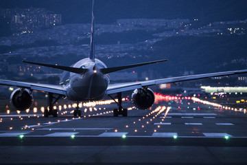 An airplane turning around the runway