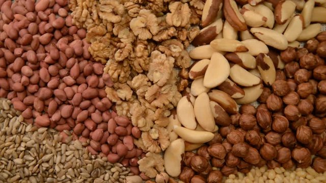 Nuts mix in a canvas bag in table.