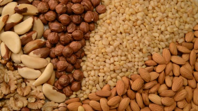 Nuts mix in a canvas bag in table.