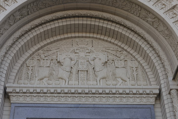 Stucco sacred decoration at the entrance to the cathedral