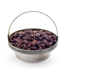 Raw red bean in silver bowl and on white background