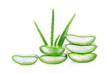 Fresh aloe vera leaf and slices isolated on white background