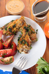 Chicken wings in sauce