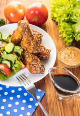 Chicken wings in sauce