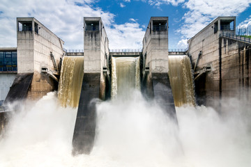 Draining water from the hydroelectric dam. - obrazy, fototapety, plakaty