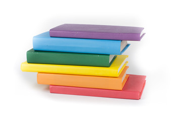 Book stacking. Open book, hardback books on white background. Back to school. Copy space for text.