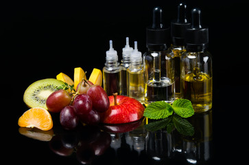 Perfume liquid in bubbles surrounded by ripe fruit and fresh mint