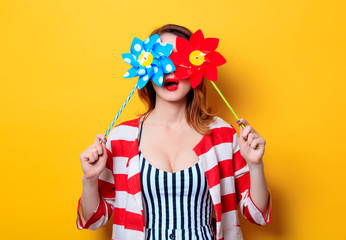 Woman with pinwheel toy