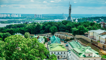 Kyiv cityscape from bell tower of Kyiv-Pechersk Lavra with view of Dnipro and Matherland Statue, Kyiv, Ukraine