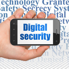 Security concept: Hand Holding Smartphone with Digital Security on display