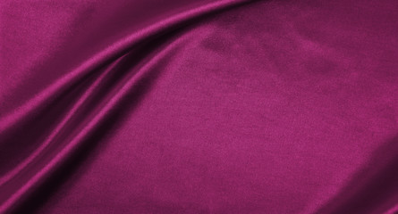 Fototapeta premium Smooth elegant pink silk or satin luxury cloth texture as abstract background. Luxurious background design