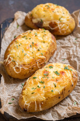 Baked stuffed potatoes with cheese and bacon