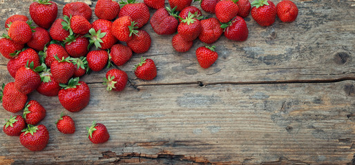Fresh strawberries on wood
