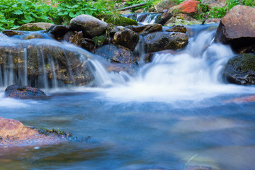 Fototapeta na wymiar Waterfalls on the river in the Giant Mountains