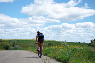 Obraz premium girl on a bicycle