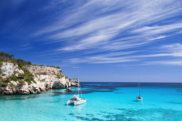 Beautiful bay with sailing boats yacht, Menorca island, Spain. Yachting, travel and active...
