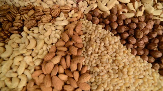 Nuts mix in a canvas bag in table.