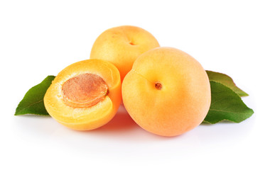 Ripe fruit for healthy life. Fresh apricot with green leaves