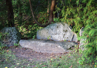 Stone sofa in old park