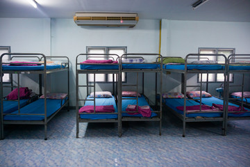 a row soldier bunk beds.