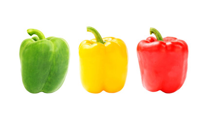 green yellow and red bell pepper on a white background.