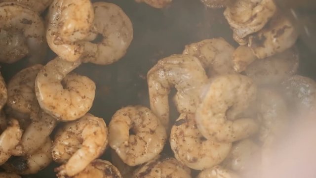 Time-lapse. Cooking seasoned shrimp for chipotle shrimp tacos
