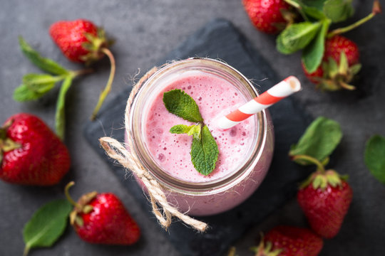 Strawberry milkshake or smoothie in glass jar