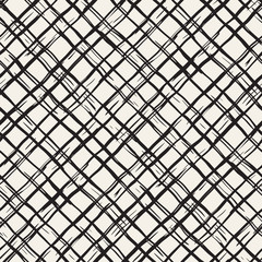 Hand drawn seamless plaid pattern. Allover pattern with ink doodle grunge grid. Graphic background with tartan.