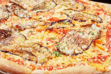 vegetable pizza with eggplant closeup macro view