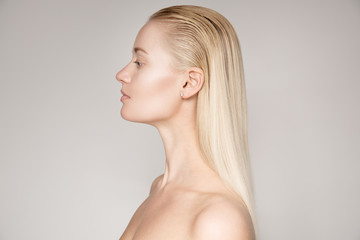 Portrait Of A Beautiful Young Blond Woman With Long Straight Hair