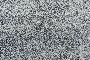 Close up asphalt texture with white stains