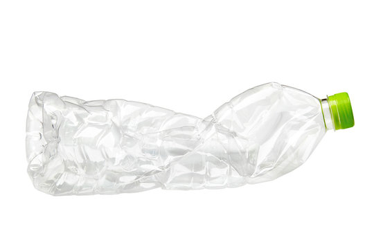 Crumpled empty plastic bottle isolated on white 