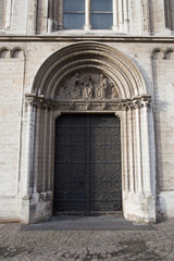 Door of a church Notre Dame de la Chapelle in Brussels