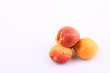 Fototapeta na wymiar Closeup apricot fruits became red with sun