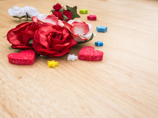 valentine's day, clear background, heart, red and white roses, on wooden table.