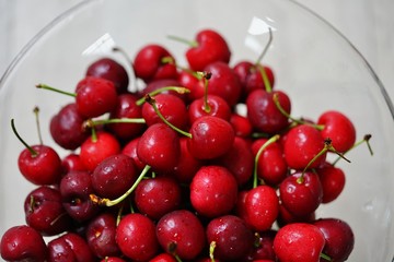 Bowl of bright red ripe cherries