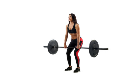 Fototapeta na wymiar Young athletic woman doing deadlift with a barbell on a white isolated background, position of a semi-squat, legs at shoulder level