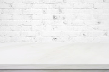 Empty white marble table over brick wall background, product display montage